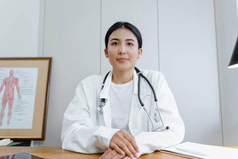 Doctor with a stethoscope around neck.